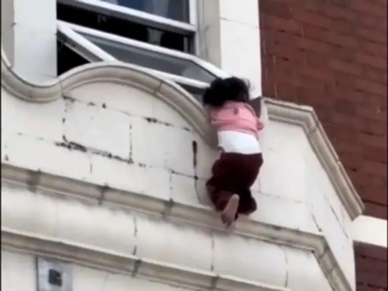 Toddler Dangling from Ledge in East London Rescued by Officer and Bystander