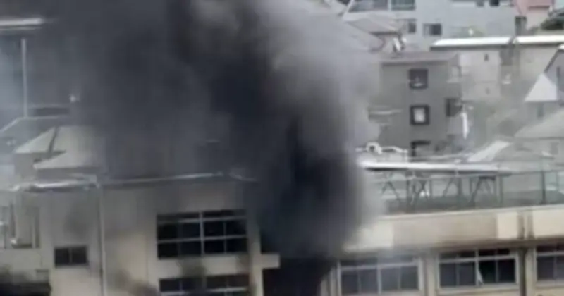 Tokyo School Fire: Children Cling to Window Ledge in Harrowing Escape
