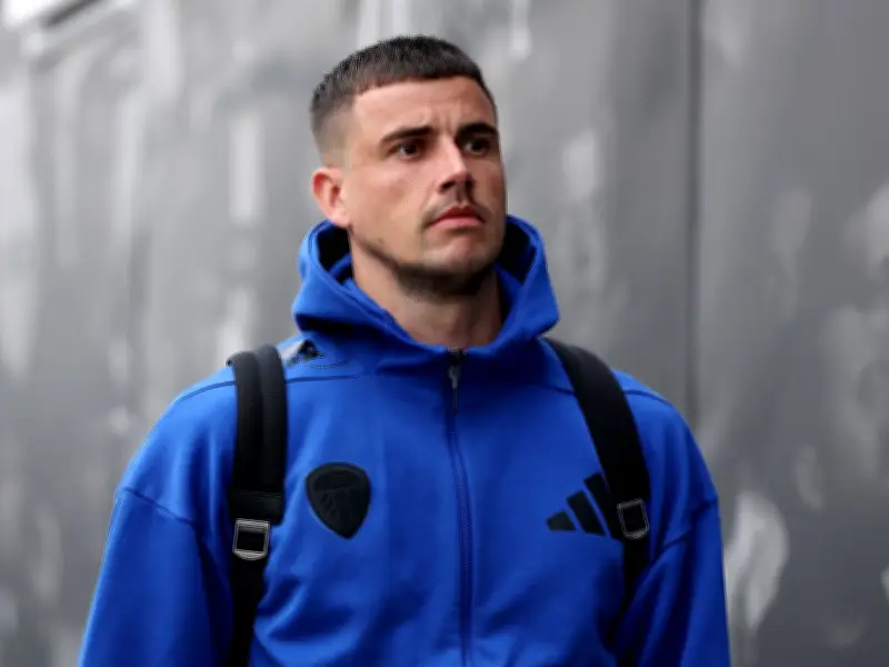 Tottenham and Manchester United Battle for Leeds' Karl Darlow