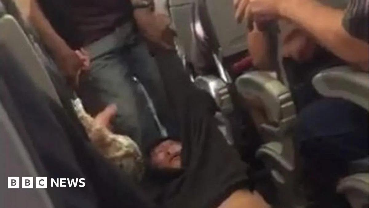 United Airlines Faces Backlash After Passenger Dragged Off Overbooked Flight