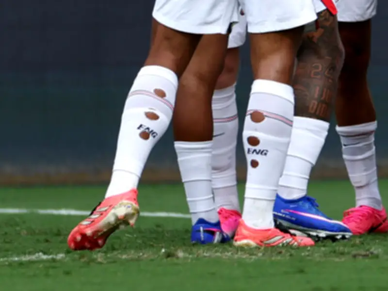 Why Jude Bellingham and England Stars Cut Holes in Their Socks Explained