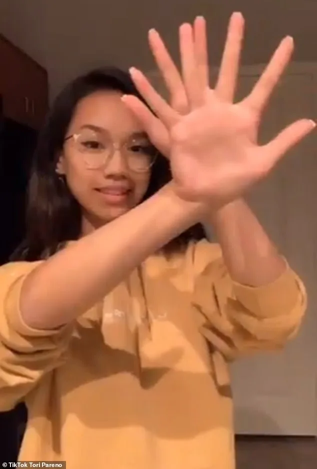 Woman Baffles Internet with Optical Illusion That Makes Hands Seem to Pass Through Each Other
