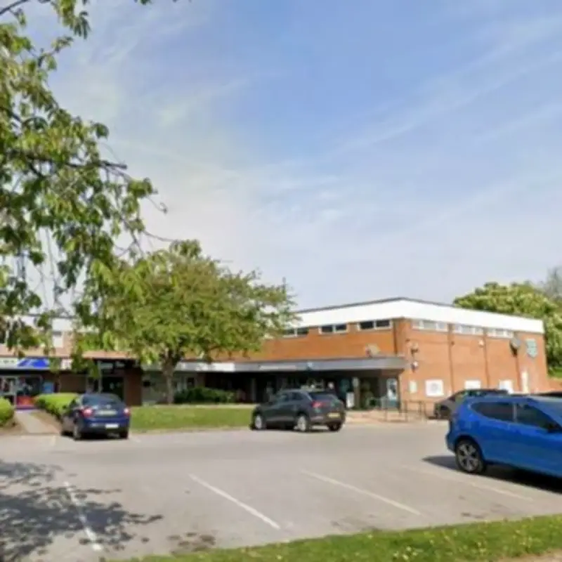 Woman Found Dead in Car in Stockport: Investigation Ongoing