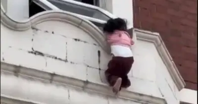 Bystander and Police Rescue Toddler from Window Ledge in Ilford