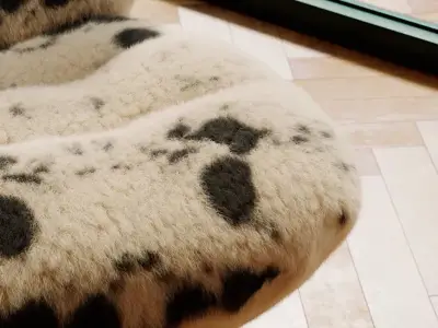 Dunelm Slashes £149 Zaley Cow Print Swivel Chair to £104.30