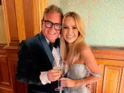 Alan Carr's 50th Birthday: Amanda Holden Plants a Kiss on His Lips