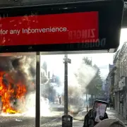 Belfast Bus Set Ablaze at Anti-Immigration Protest After Knife Attack