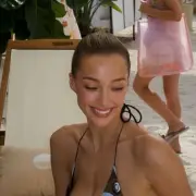Brit Model Penny Lane Wows in Plunging Bikini at Beach Club