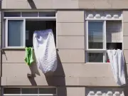 Brits Urged to Hang Damp Towels in Windows to Beat Heatwave