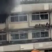 Children Cower on Ledge as Fire Engulfs Tokyo School, 10 Injured