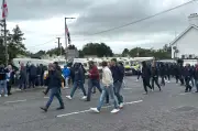 DUP MP Defends Photo with Masked Men at Scarva Protest