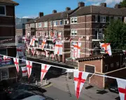 England Flag Reclaimed by Communities Amid Far-Right Tensions