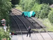 Fatal Level Crossing Crash: Man Dies, Child Critical in Lancashire