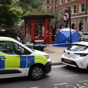 Forensic Tent in Manchester City Centre After Serious Incident