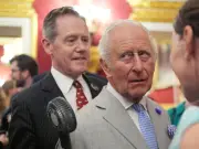 King Charles Fanned by Aide at Climate Event on Hottest June Day