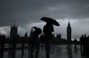 Londoners Bemoan Awful Weather as Torrential Rain Sweeps Capital