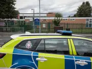 Man charged after incident at Salford primary school