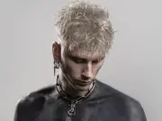 MGK Reveals Gruesome Side Effects of Blackout Body Tattoo