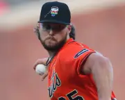 MLB Criticizes Giants Players Writing Bible Verses on Pride Caps