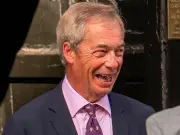 Nigel Farage Celebrates Brexit Anniversary at Fancy French Restaurant While MPs Debate Defence