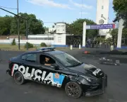 Off-duty Argentine police in second jobs 'kill and die more' as recession bites