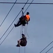 Paraglider Dangling from Cable Car Wires After Crash in Switzerland