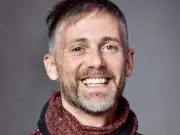 Professor cleared after car thief dies in headlock incident