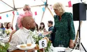 Queen Camilla Reunites with TikTok Star Spudman at British Library Event