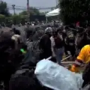 Riot Police Clash with Protesters Outside World Cup Opening Ceremony