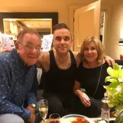 Robbie Williams Lookalike Dan Budd Gets His Dad's Approval and Tiger Pants