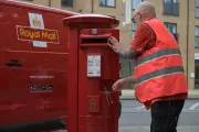 Royal Mail Annual Profits Halve as Labour Costs Surge