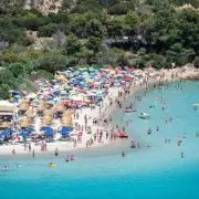Sardinian Beach Bans Umbrellas for Most Sunbathers in 40C Heat