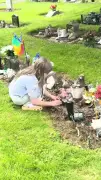 Schoolgirl, 9, Hailed 'Angel' for Tending to Strangers' Graves in Cemetery