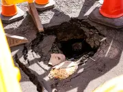 Sinkhole Opens on Oldham Street During Heatwave, Residents Fear Collapse
