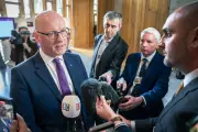 Swinney warns further protests after Belfast stabbing are 'ill-advised'
