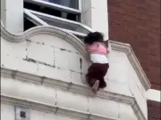 Toddler Dangling from Ledge in East London Rescued by Officer and Bystander