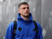 Tottenham and Manchester United Battle for Leeds' Karl Darlow