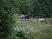 Tragic Water Deaths in Greater Manchester as Search for Missing Boy Continues