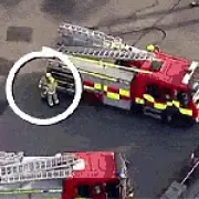 Two firefighters brawl during Belfast riots in live broadcast