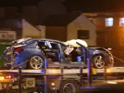 Two Hospitalised After Car Collides with Police Vehicle in Rochdale