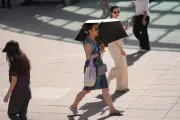 UK Heatwave: Record Temperatures Loom as Red Warning Disrupts Transport, Schools, and Hospitals