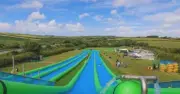 UK seaside town opens world's biggest 440ft slip and slide park for £14