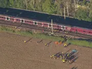 Unanswered Questions Linger After Fatal Bedford Train Crash Kills Driver, Injures 100