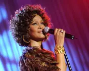 Whitney Houston Estate Denies Oprah's Claim Singer Fell Off Stage Due to Drugs