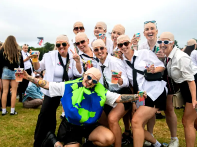 Bald Caps and Suits Take Over Cardiff for Pitbull Concert