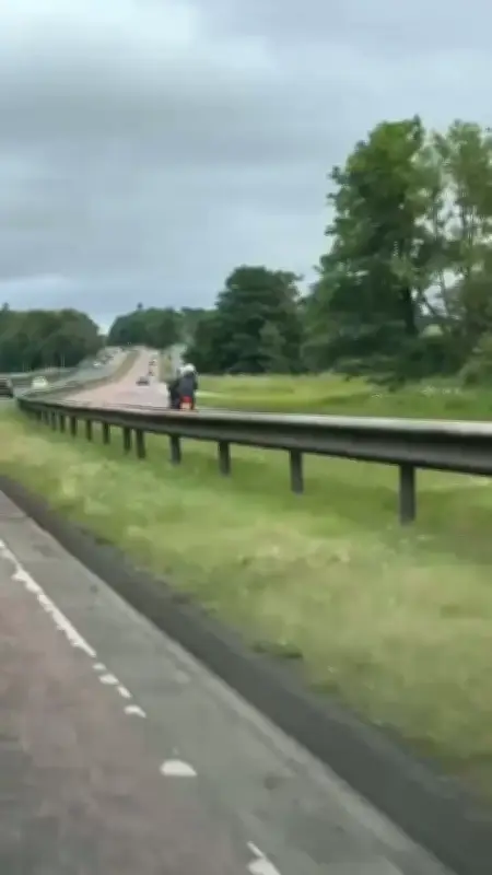 Motorcyclist 'flying up wrong side of A90' with passenger in shocking footage
