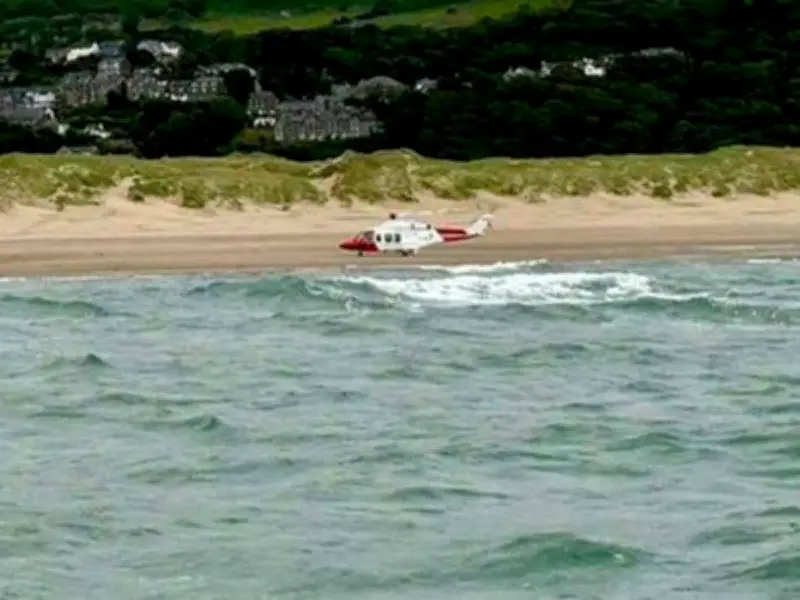 Person clings to cool box for hours after boat capsizes off North Wales