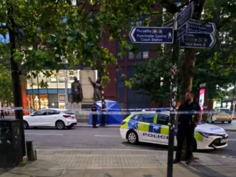 Police cordon off Piccadilly Gardens in Manchester with blue tent after incident