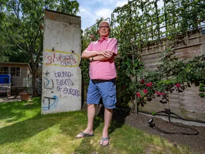 Man Installs Berlin Wall Section in Garden, Sparks Planning Row