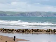 Children Rescued from Rip Currents at Tywyn Beach, Lifeguard Calls Renewed